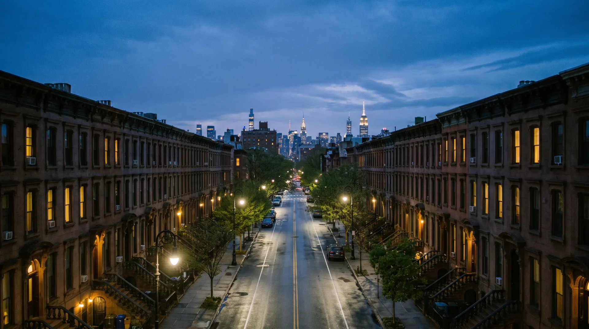 Cannabis delivery in Brooklyn, NY: a brownstone-lined avenue at blue hour with the Manhattan skyline behind it